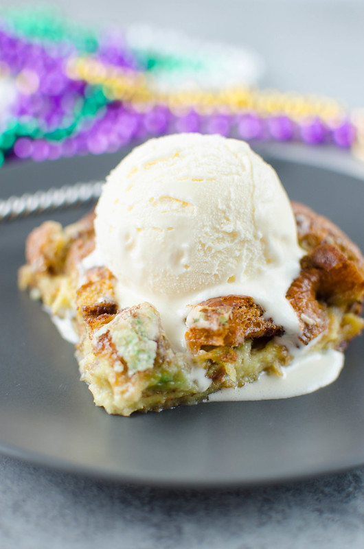 King Cake Bread Pudding - cubed king cake baked in a sweet custard and topped with vanilla ice cream. Perfect for Mardi Gras!