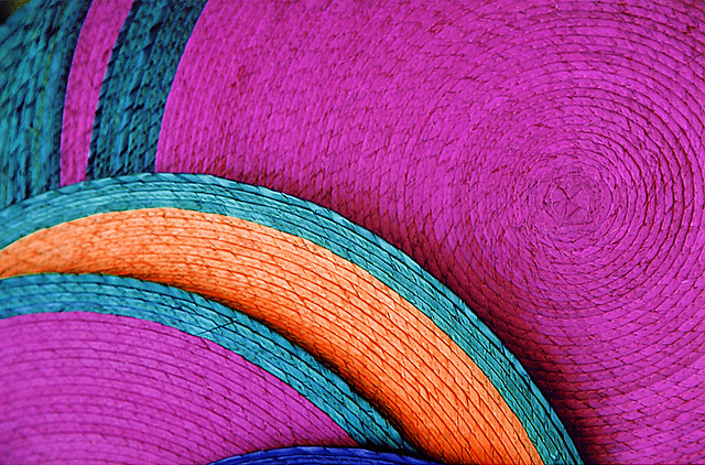 large colourful straw mats in a Mexican market