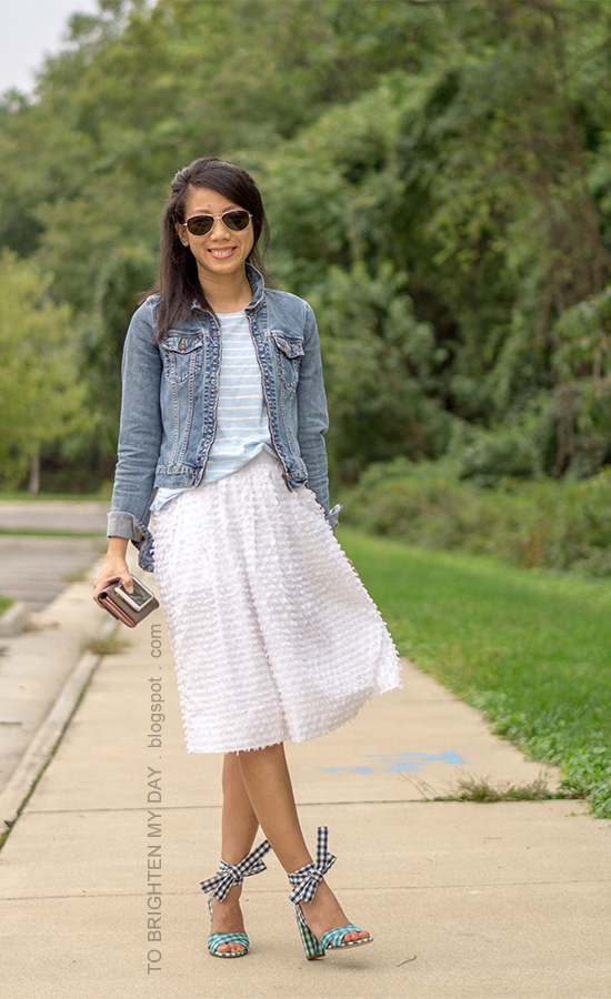 denim jacket, blue striped top, taupe clutch, white clip dot midi skirt, turquoise and blue gingham ankle-tie sandals