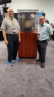 Orosz and Schena with 1974-D aluminum cent at 2016 ANA